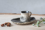 Black ceramic espresso cup with saucer 