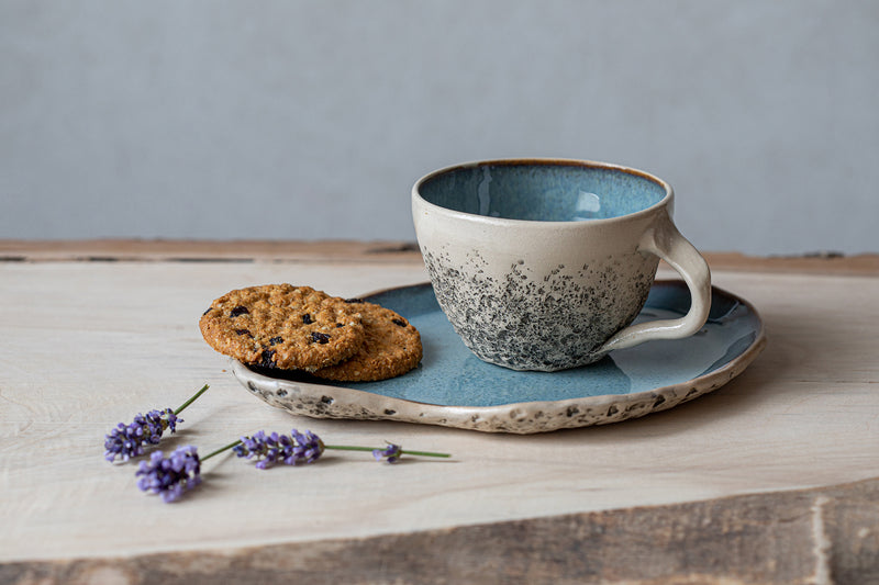 https://kariceramics.com/cdn/shop/products/Kari_ceramics_handmade_pottery_blue_ceramic_tea_cup_with_saucer_800x.jpg?v=1669647333