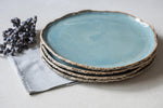Pile of four Blue handmade ceramic dinner plates Dishwasher safe