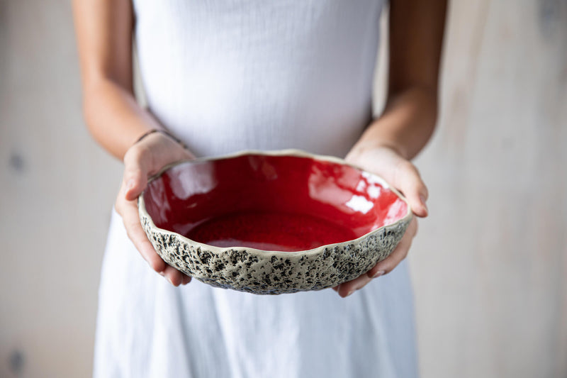pottery miso bowl held in hands 