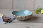 Organic shaped Blue Salad bowl on wooden table